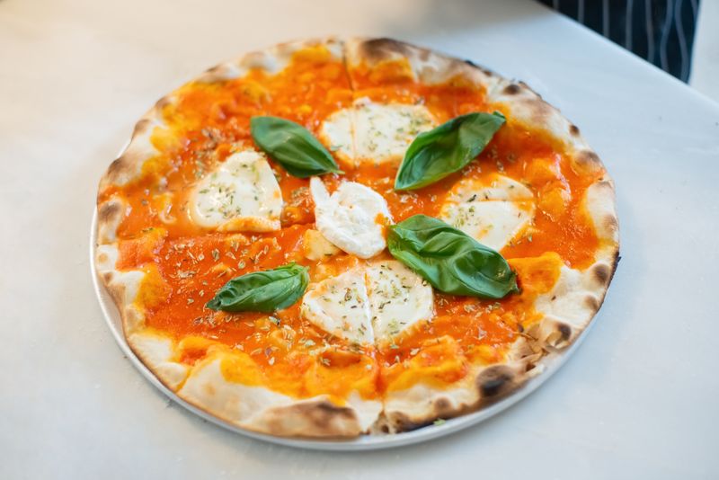 Margherita Classica pizza with fresh basil