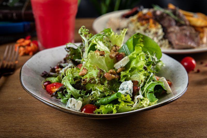 Dions House Salad with fresh greens and vegetables